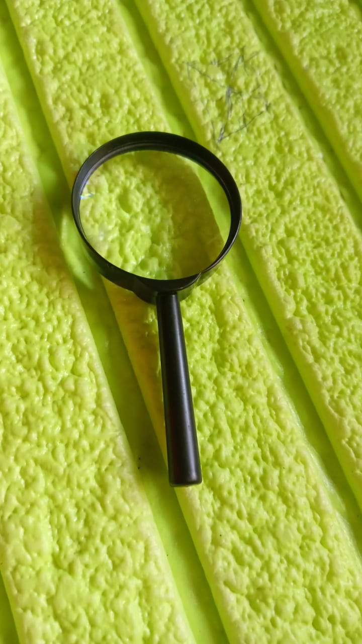 50mm magnifying glass with a real glass lens and sturdy handle for comfortable use.