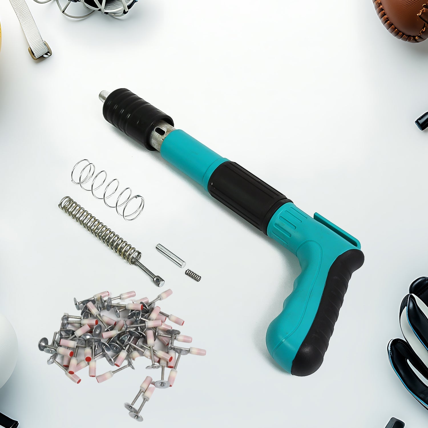 BoltForce manual steel nail gun with included nails, ready for efficient use.
