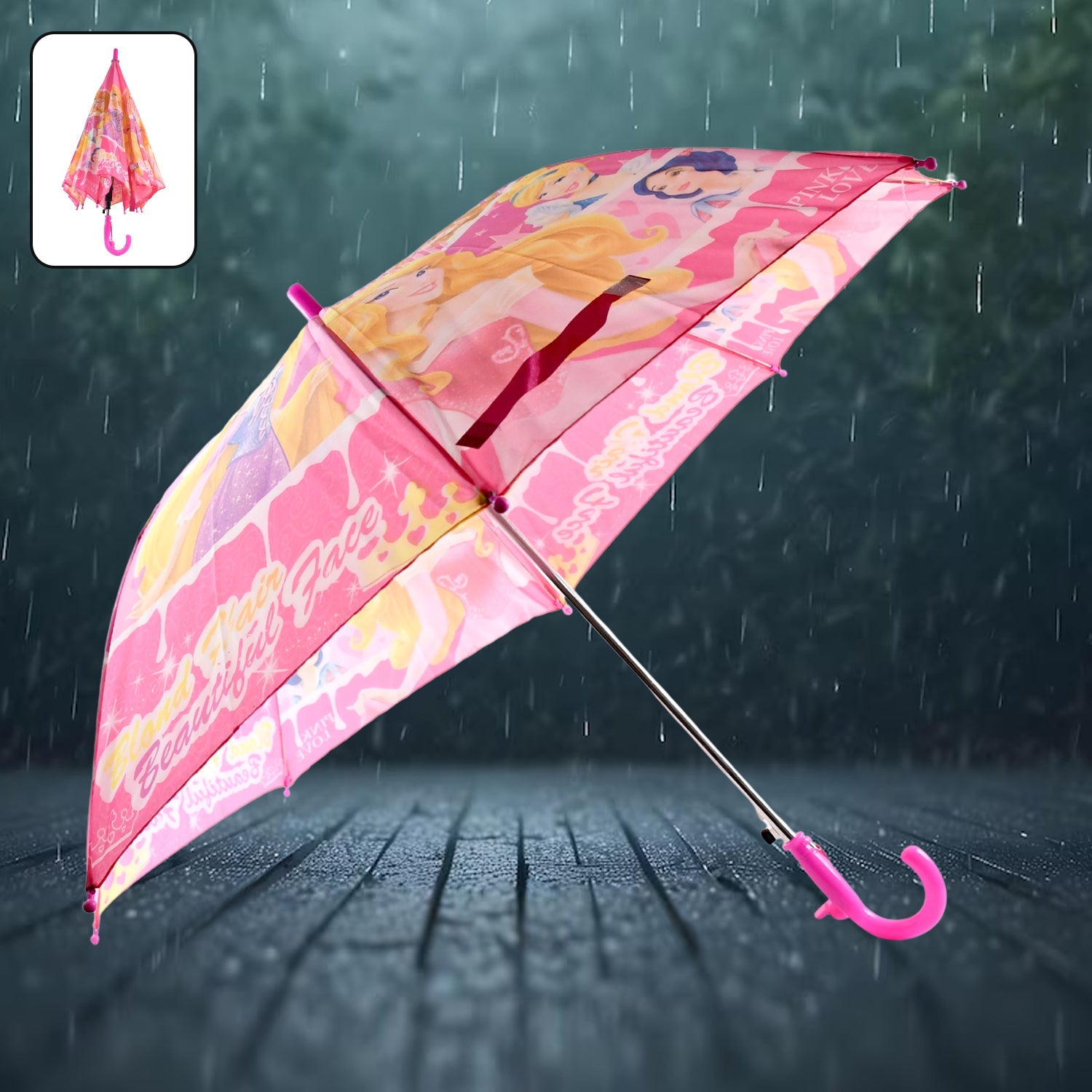 A pink umbrella featuring various princess characters is open on a wet, dark surface with rain falling.