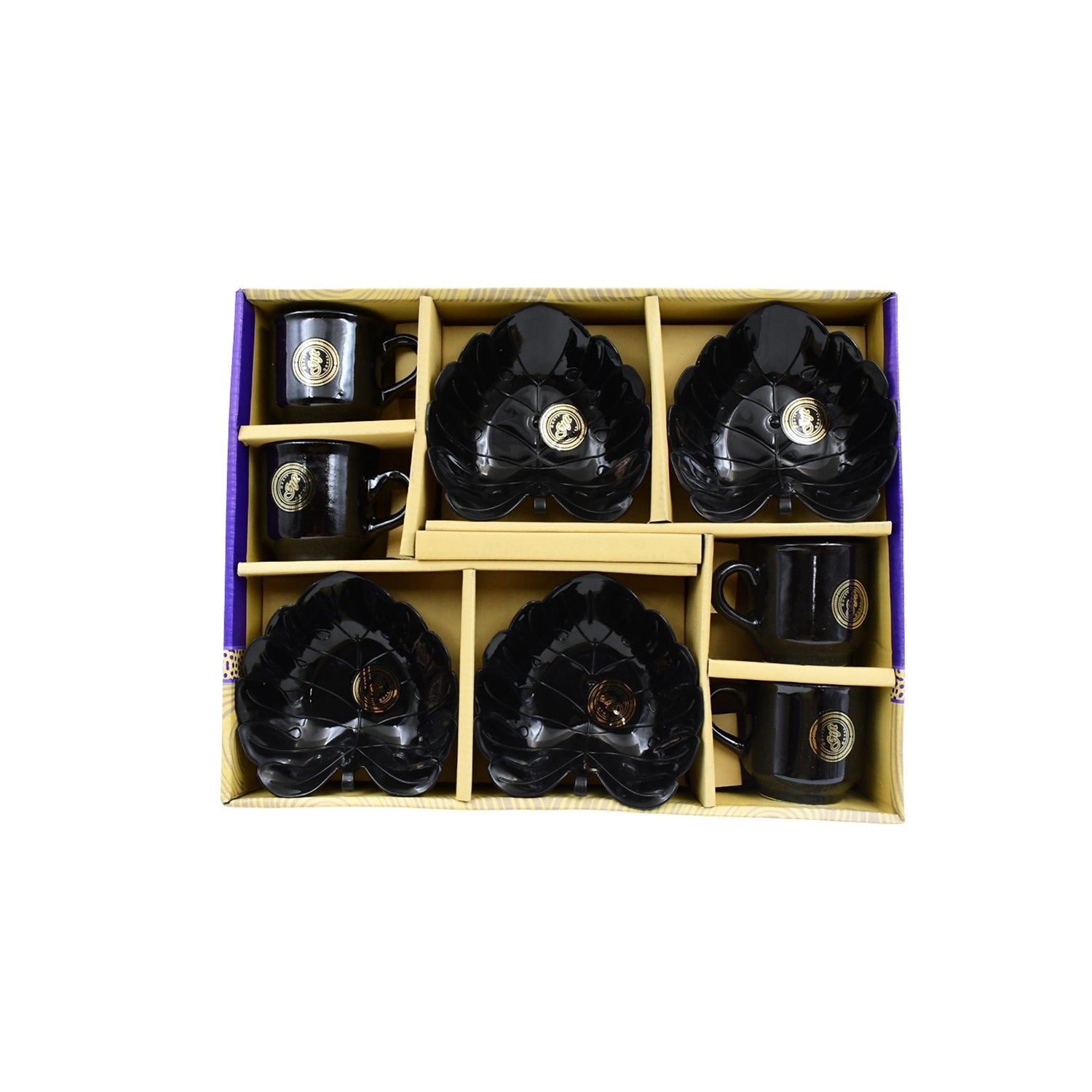 Detailed shot of the ceramic tea cups and the unique plastic leaf-shaped serving bowls.