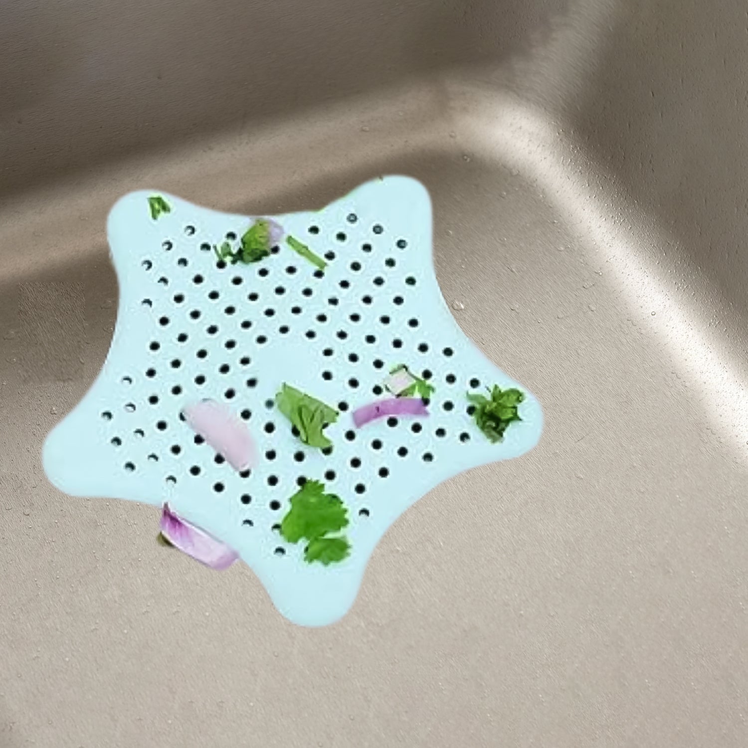 Practical silicone hair catcher placed perfectly over a bathroom sink drain.