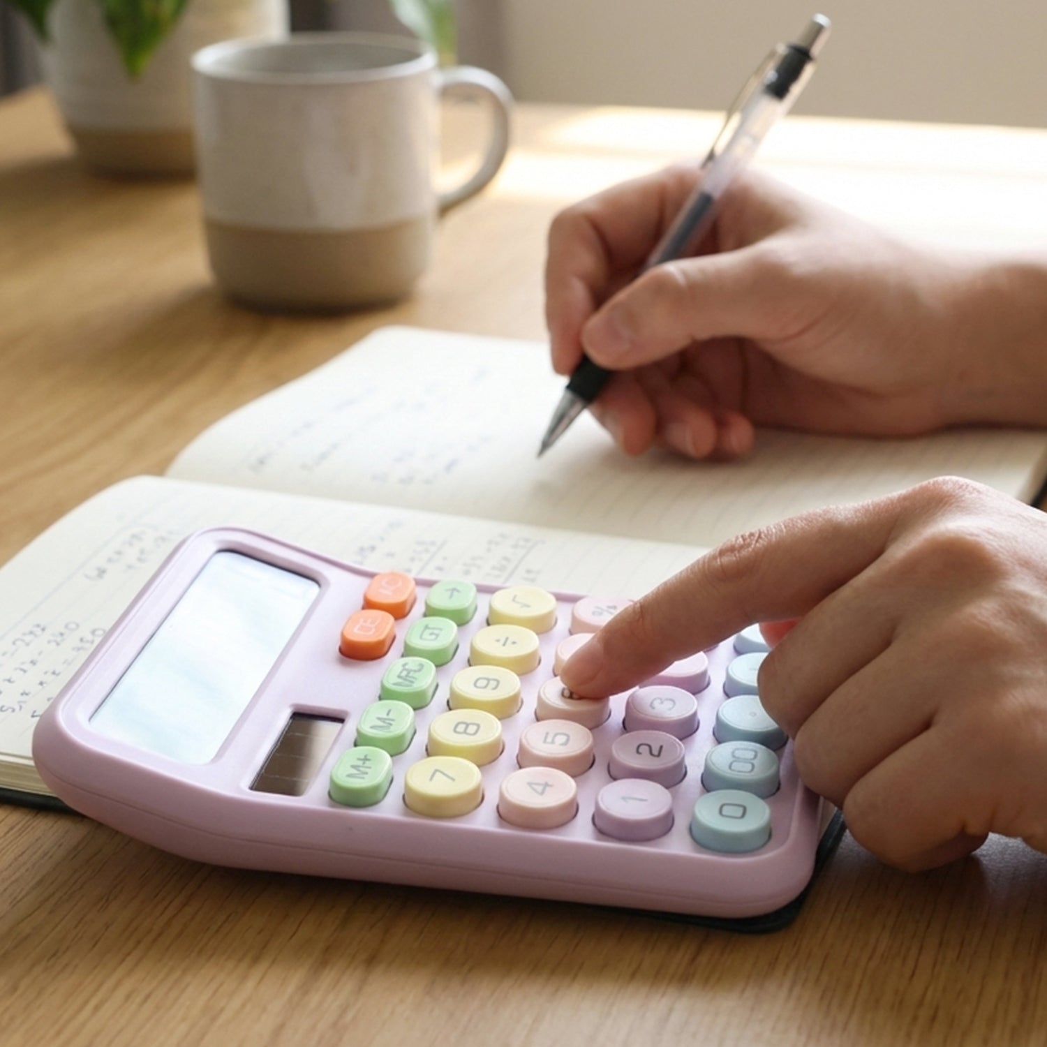 Close-up of electronic calculator with soft press multicolor keys