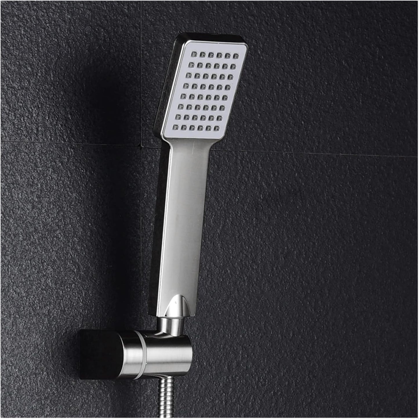 Person holding the handheld shower head, demonstrating its easy grip and versatile use.