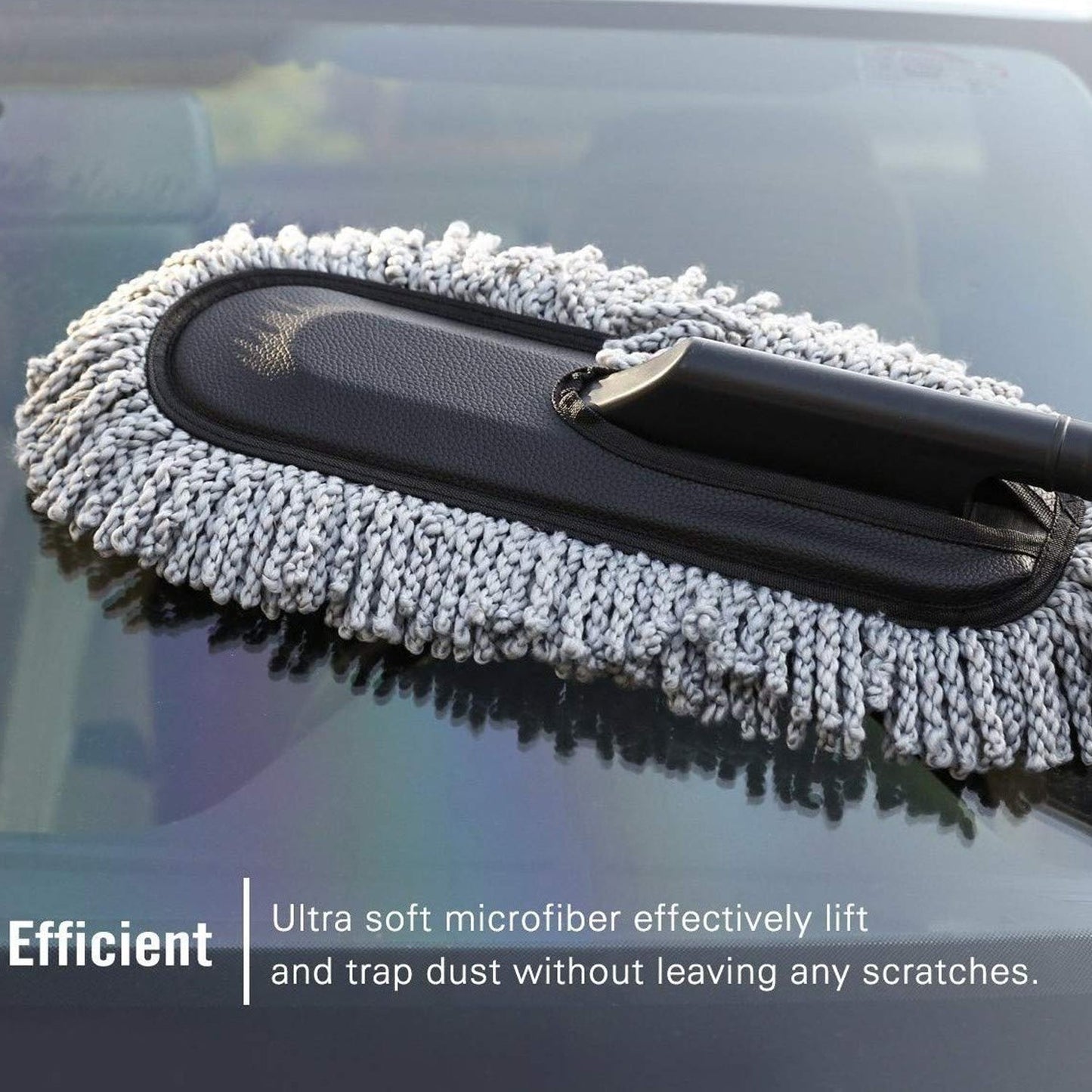 Car Dust Brush effectively removing accumulated dust from a car's air conditioning vent.