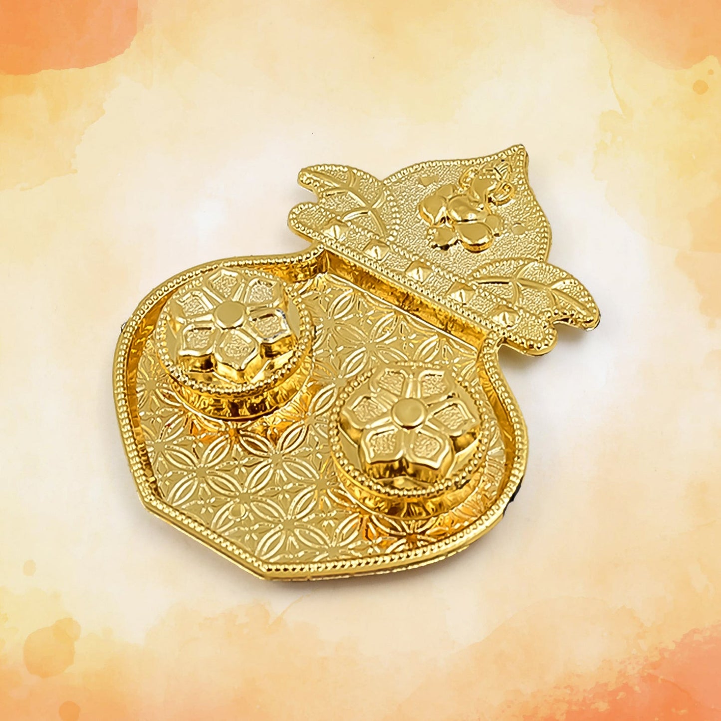 Detail of the integrated kumkum holders on the Raksha Bandhan thali.