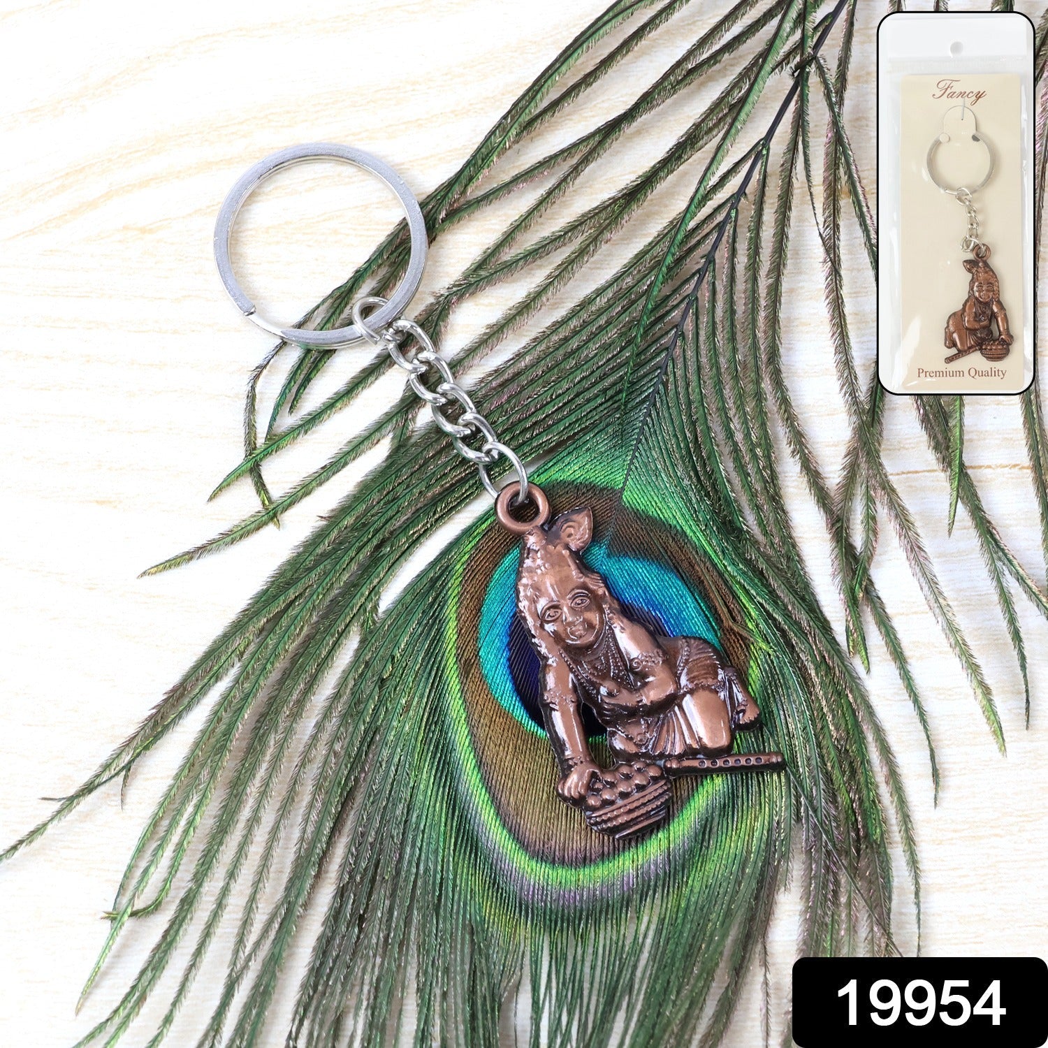 Close-up of detailed Bal Krishna crawling metal keychain