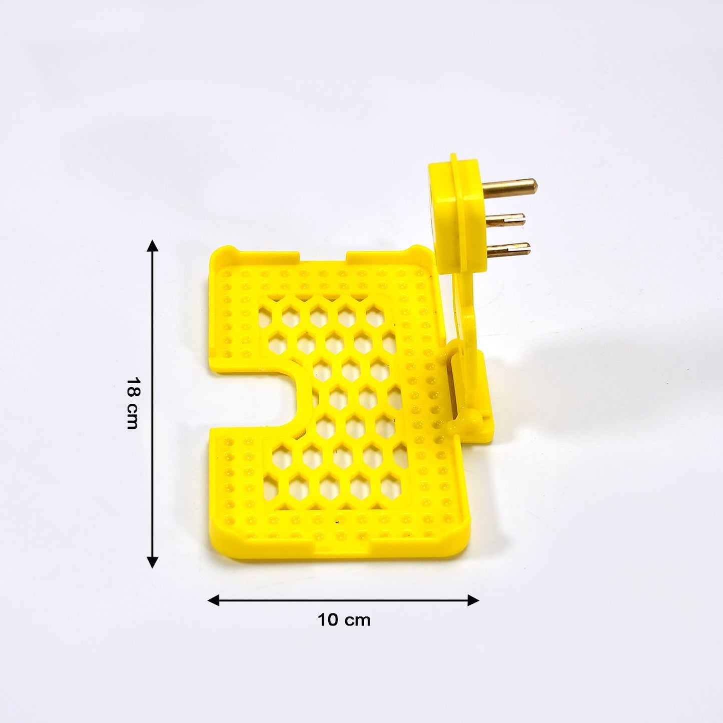 Detail of the three-pin design of the yellow mobile charging wall holder for secure fit.