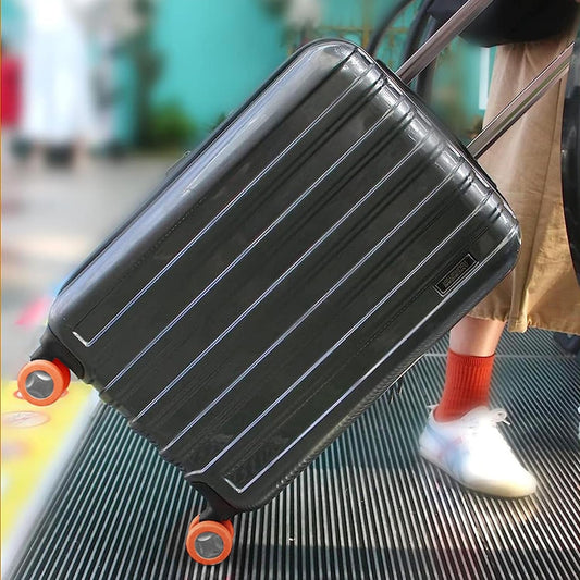 Set of eight vibrant silicone luggage wheel covers, ideal for suitcase protection.
