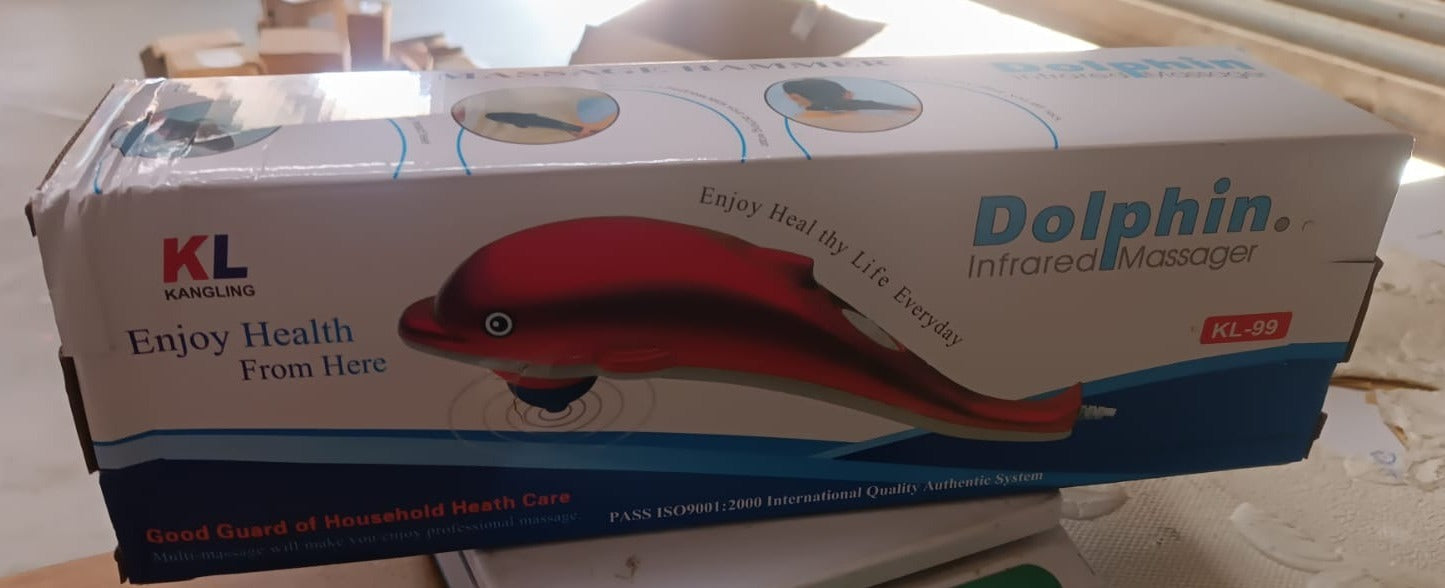 Person enjoying soothing stress relief using the Dolphin Handheld Massager.