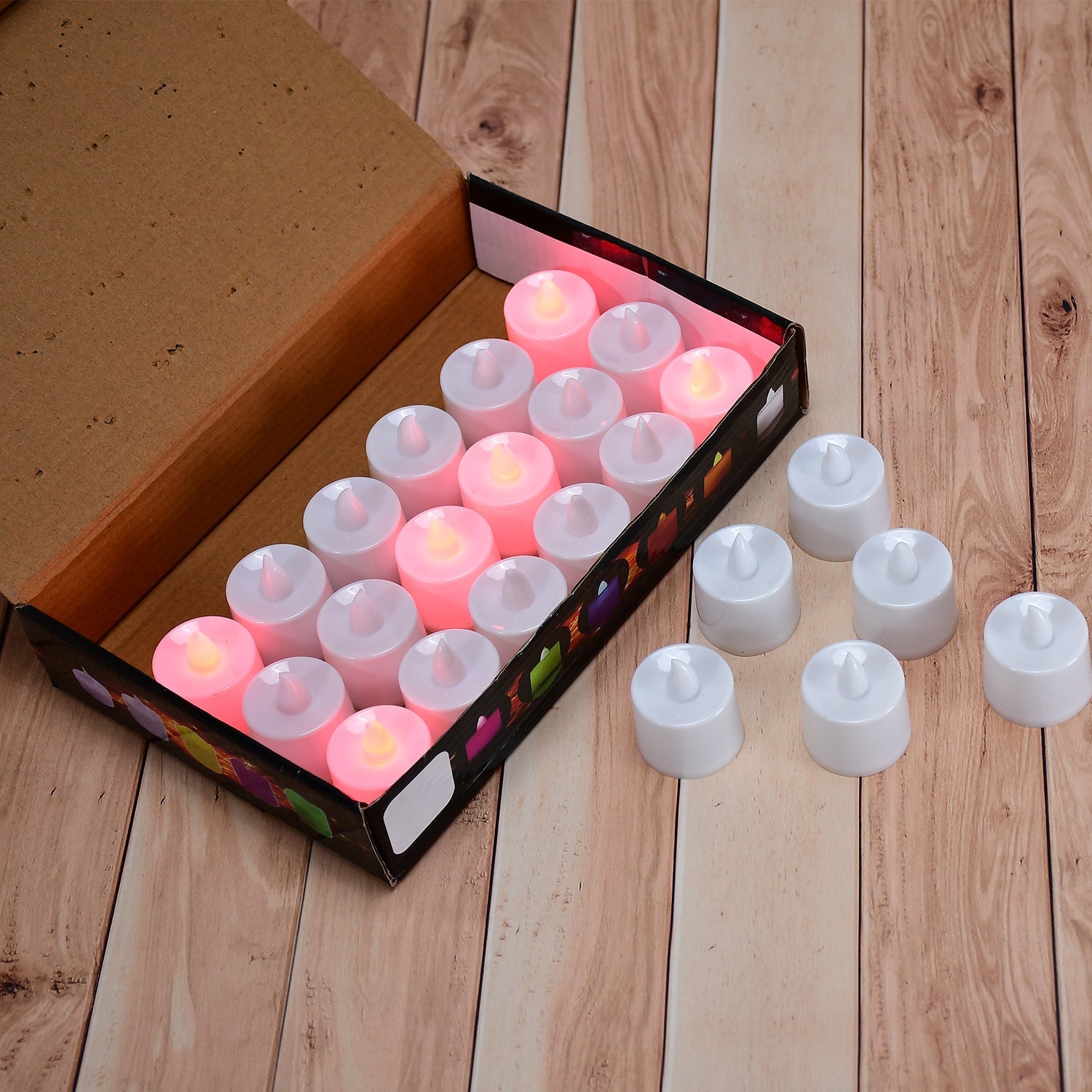 Vibrant red LED tealight candles, a pack of 24 for festive decorations.