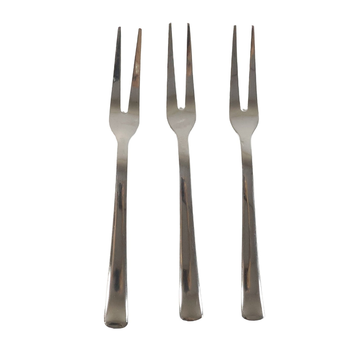 Three small appetizer forks laid out for serving snacks