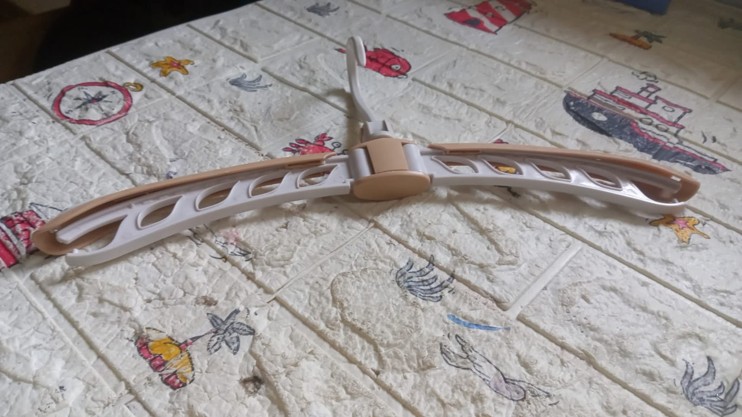 Multiple folding hangers stacked for efficient storage.