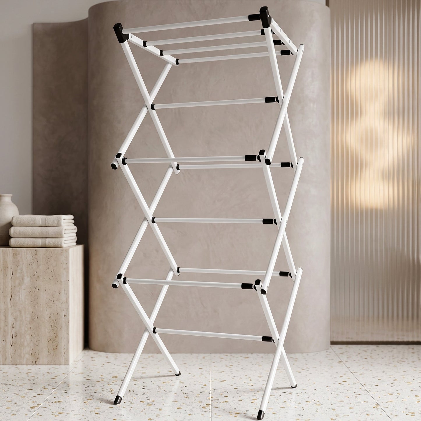 Compact metal laundry drying rack designed for small spaces