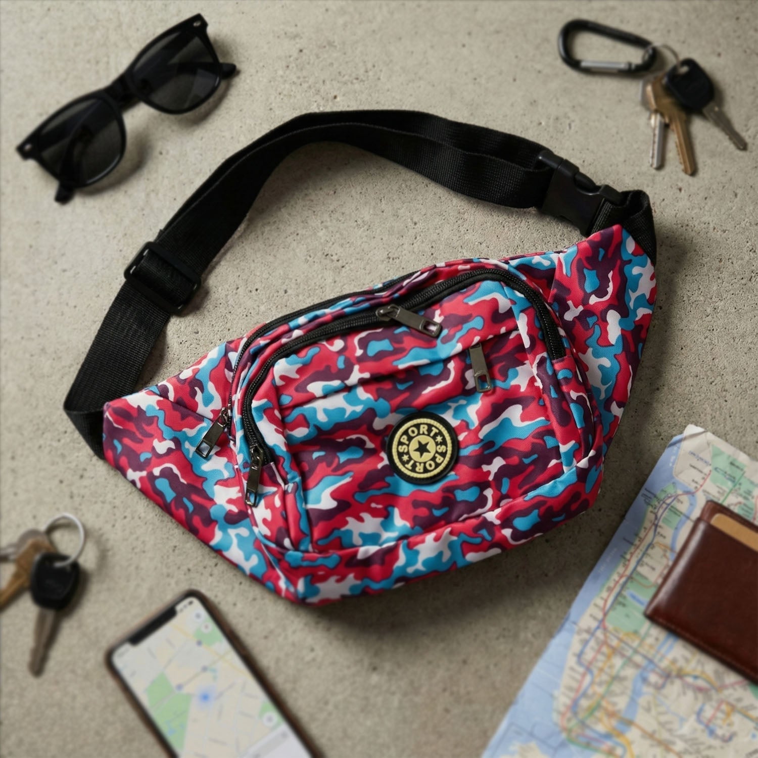 Close-up view of multiple compartments in waist and sling bag