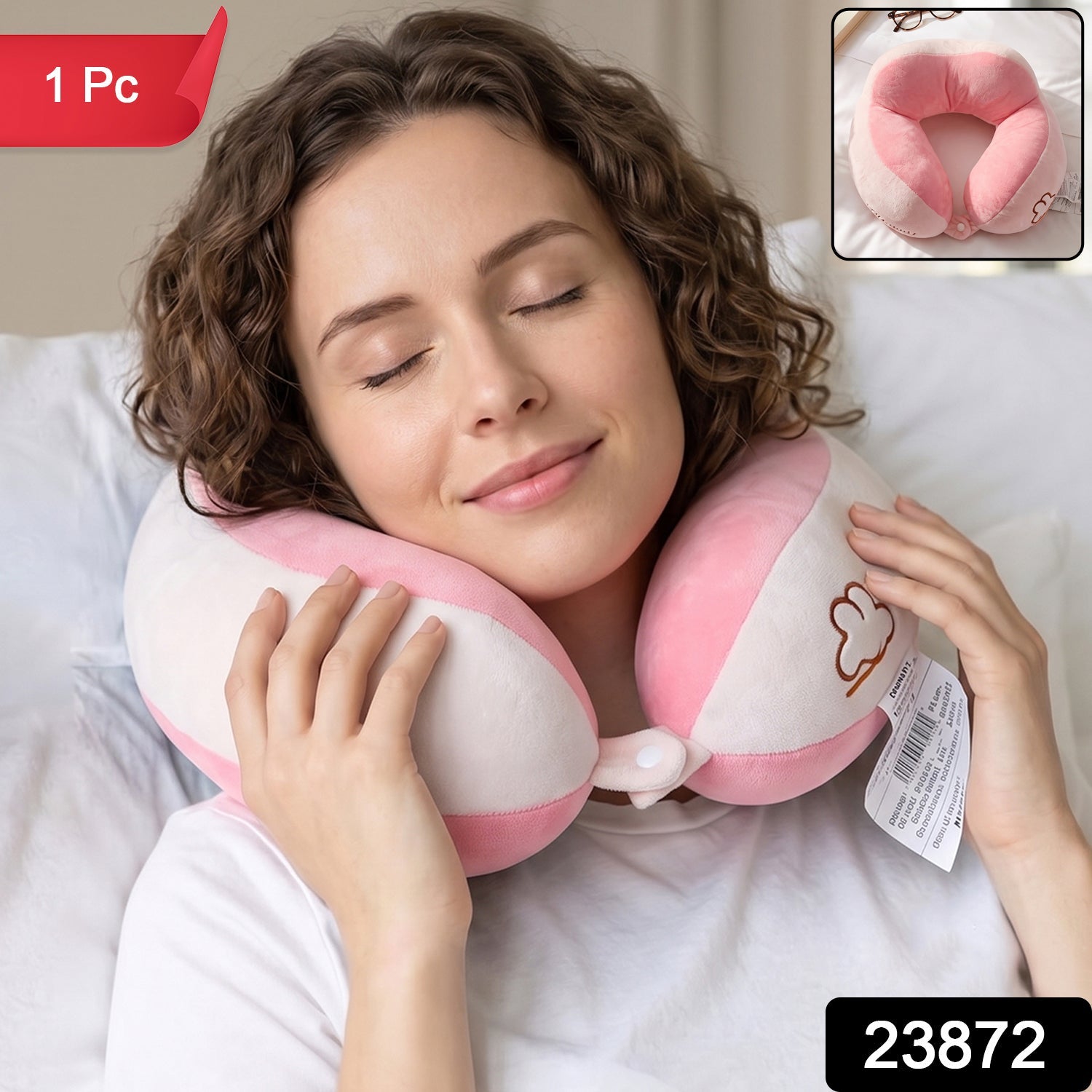 Soft plush pink and white U shaped pillow for travel comfort